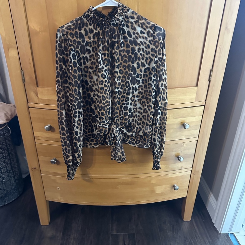 Multiple blouses, various colors